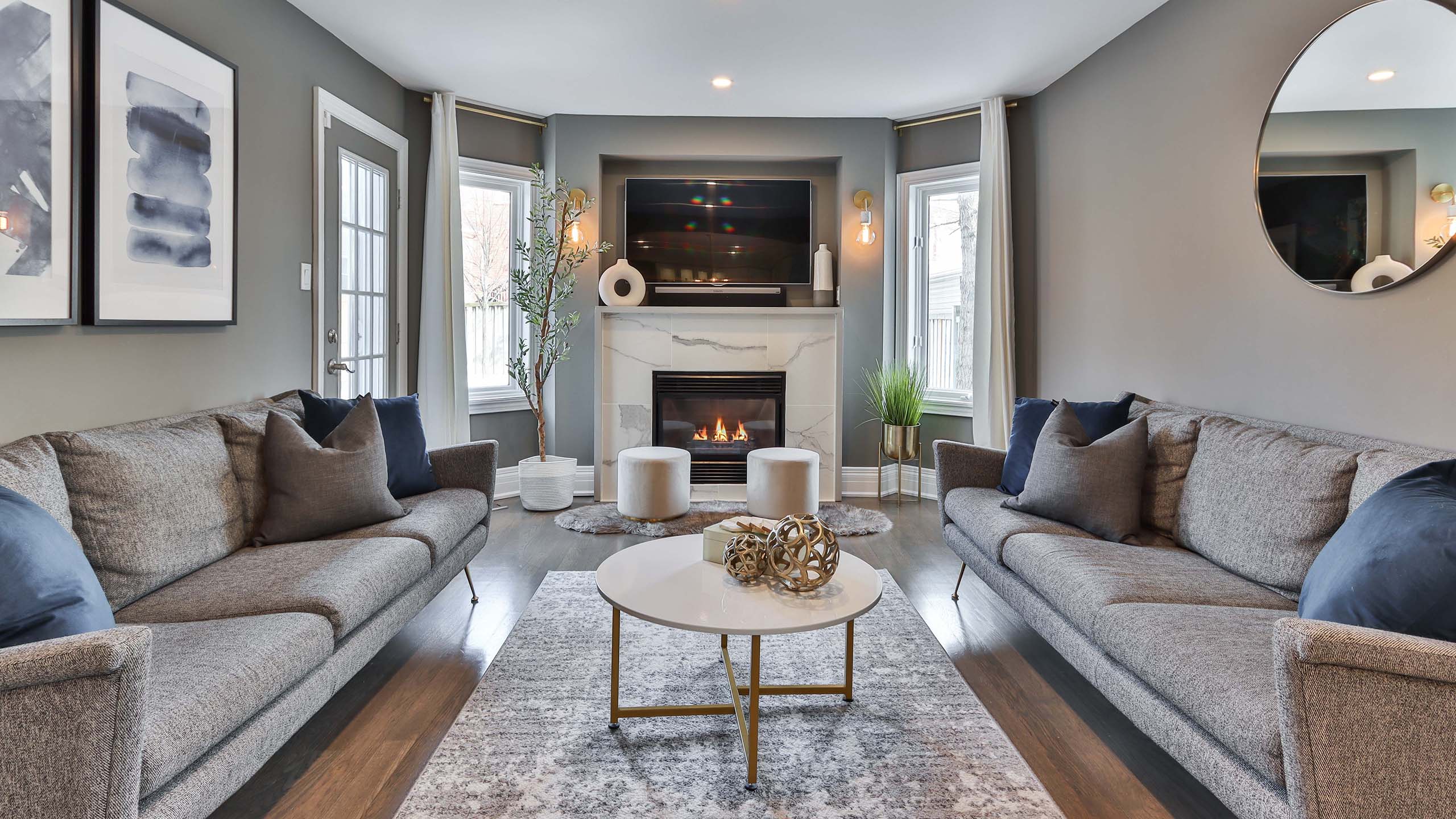 inside luxury home grey with fireplace